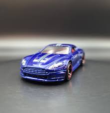 Image result for Midnight Blue 2010 Aston Martin