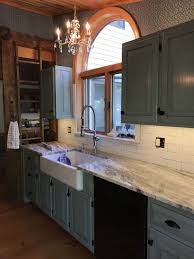 Find and save ideas about painting kitchen cabinets on pinterest. Chalk Painted Kitchen Cabinets Duck Egg Blue With Black Wax Simple Update To A 1920 S Farmhouse Chalk Paint Kitchen Cabinets Black Kitchens Kitchen Cabinets