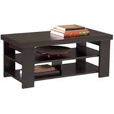 This rectangular transforming coffee table helps save space with its adjustable height glass top sitting lightly on a metal frame. Larkin Coffee Table By Ameriwood Multiple Finishes Espresso Black Forrest Walmart Com Contemporary Coffee Table Home Coffee Tables Black Coffee Tables