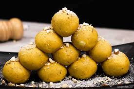 Now take out a handful of the mixture and make a round shape with both the hands. Besan Ladoo Recipe How To Make Besan Ladoo At Home