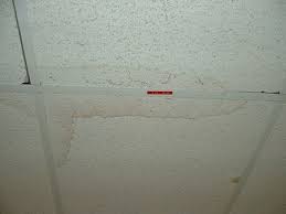 Drywall installing drywall is another solid solution for an ugly ceiling. Bad Looking Stained Old Drop Ceilings Faux Tin Ceiling Tiles Is The Perfect Solution Cleaning Hacks Remove Water Stains Water Stain On Ceiling