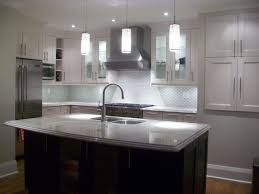 Captivate Light Gray Kitchen Cabinets Under White Pendant Lamps Near Dark Brown Islands With Grey Countertop Arcivist Kuhnya