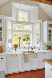 Kitchen sink window treatment with curtain. A Crazy Bay Window Story Tons Of Tips To Get A Professional Look Laurel Home
