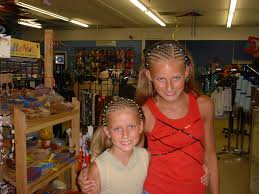Keeping your hair in braids will keep it from getting tangled and knotted. Get Funky With Some Island Braids Or A Cool Hair Wrap The Local S Guide To Hhi