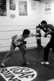 SGT Wilfredo Esperon, left, spars with SGT Kevin Wages