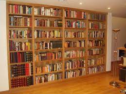 Miniature books in wooden library cabinet harrods of knightsbridge. Libraries And Wall To Wall