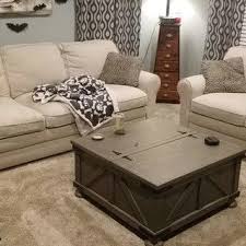 The sturdy engineered wood table features a spacious open cubby for board games, reading materials, and decorative accents. Aldwin Coffee Table With Lift Top Ashley Furniture Homestore Coffee Table Coffee Table With Storage Furniture