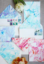 Once the full sheet is in contact with the surface, peel it back and rinse gently in the tray of water. Diy Paper Marbling Honestly Wtf