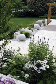 Greencube Garden And Landscape Design Uk Sculpture In The Garden Greencube Designs A Sculptural Rock Garden Landscaping Landscape Design Landscape Projects