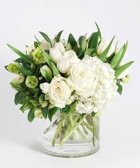 Maybe you would like to learn more about one of these? This Refreshingly Simple Design Features An Elegant Collection Of Crisp White Blooms I Flower Arrangements Simple Flower Arrangements White Flower Arrangements