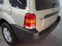 Image result for Gold Ash 2004 Escape