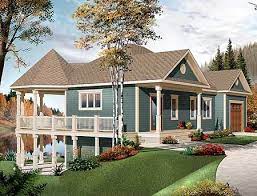 Plan 22312dr Country Home With Beautiful Open Floor Plan For A Rear Sloping Lot In 2021 Vacation House Plans Country Style House Plans Lake House Plans
