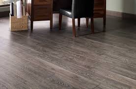 Waterproof laminate flooring buying guide. Black Forest Oak Waterproof Laminate Tough Oak Wood Laminate
