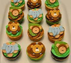 She carries a whole line of wild one birthday, and baby shower designs in her shop and custom colored this set for our baby boy shower. The Cutest Little Cakes By Celeste Jungle Cupcakes For Boy Baby Shower Cupcakes For Boys Jungle Baby Shower Cake Baby Boy Cupcakes