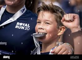 Prince Vincent with his medal after reaching the finish line during the  one-mile race at Royal Run 2021 in Copenhagen. Sunday, September 12, 2021.  (Photo: Mads Claus Rasmussen/Ritzau Scanpix Stock Photo