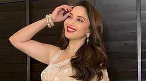 Madhuri Dixit Nene wears a sheer, floral sari with diamond jewellery |  VOGUE India