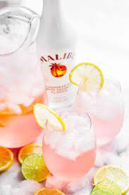 This drink is full of lemonade and fruit punch, rum, and vodka and is the perfect easy alcoholic sparkling punch recipe. Pink Vodka Lemonade Cocktail Cafe Delites