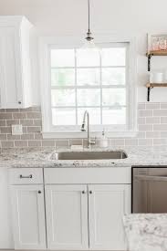 Lowe S Stock Cabinets Review White Shaker Kitchen Kitchen Cabinet Design Shaker Kitchen Cabinets