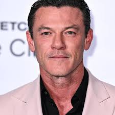 Luke Evans***