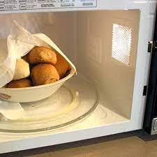 The content of the article: How To Warm Bread In The Microwave Kitchn