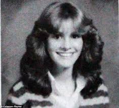 11-year-old Julia Roberts smiles bravely as she stands in front of her  'despised' step-father