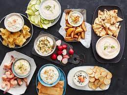 Served chilled with pita chips or cut up veggies, this recipe is perfect for a party. Easy Party Dip Recipes And Ideas Food Network Tailgating Recipes Drinks Snacks Food Network Food Network