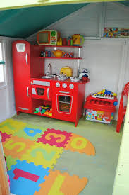 18 children's playhouses that are so cool you'll want to. The Inside Of The Kids Playhouse All Decorated Kids Clubhouse Kids Playhouse Kids Rugs
