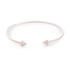 A spike bangle bracelet handmade in 18k gold & sterling silver, enhanced with 6.3 carats onyx & 1.76 carats of sparkling diamonds with blackened finish. Diamond Spike Open Cuff Bangle Atheria
