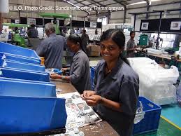 Import competition, labour market regulation, and outsourcing