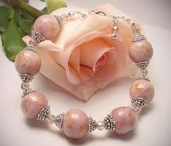 It is usually gathered out of jewelry pieces that create a solid mass in a. Preserve Your Wedding Bouquet Flowers Made Into Beads Flower Jewellery Beaded Flowers Jewelry