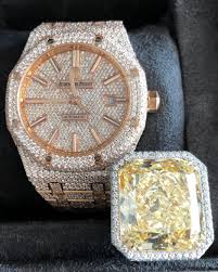 Floyd mayweather is a proud papa of a ridiculous new purchase: Floyd Mayweather Shows Off New Diamond Encrusted Watches As Boxing Legend Continues To Enjoy Ring Retirement