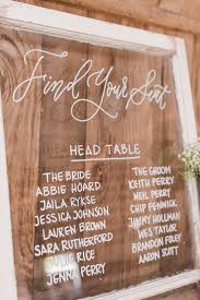 Hand Written Seating Chart On Glass For Columbus Oh Wedding
