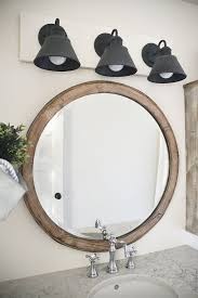 25 Pretty Farmhouse Mirror Ideas To Add Rustic Beauty To Your Home Rustic Bathroom Vanities Light Fixtures Bathroom Vanity Farmhouse Light Fixtures Bathroom