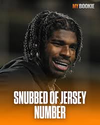 Shedeur Sanders will be wearing the number 12 this season after veteran, Deandre  Carter, took the number 2. Reports have surfaced that Shedeurs camp are  furious that his number was taken by