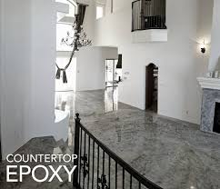 This Classy Epoxy Floor Was Poured Over The Existing Floor Create Your Epoxy Floor On Our Website Rental Kitchen Rental House Decorating Home