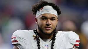 Bears release WR Muhammad; sign DE Brown to extension