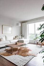 White Wall Wooden Floor White Couch How To Decorate A Small Living Room Wooden Table In 2020 Living Room Scandinavian Living Room Inspiration Living Room Modern