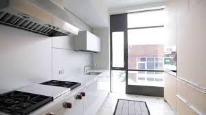 Organize storage space around the kitchen's main activities for easier cooking and flow. Interior Design Sleek Modern Bright Kitchen With Hidden Storage Youtube