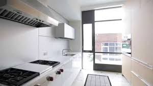 Organize storage space around the kitchen's main activities for easier cooking and flow. Interior Design Sleek Modern Bright Kitchen With Hidden Storage Youtube