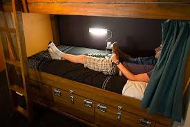 Large capacity under bed storage bag box 5 compartments clothes shoes organizer. Dorm Bed Our Custom Made Bunk Beds Have Night Lights And Lockable Underbed Storage Picture Of Haka Lodge Queenstown Queenstown Tripadvisor