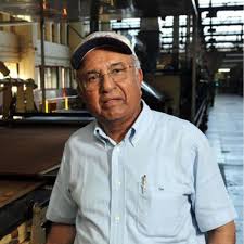 Fab - Vijay Chauhan Vijay Chauhan is the patriarch of family that controls Parle Products, best known for its popular glucose biscuit, Parle G. The privately held biscuit, confectionery and snacks maker