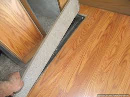 Measure the length of the transition space so you can cut the reducer mold piece and the track. Laminate In Travel Trailers
