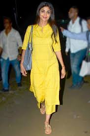 She is not just hot, she is has a very good looking and charming face. Shilpa Shetty Kundra Wears Yellow Cotton Kurta Set In Madh Island Vogue India