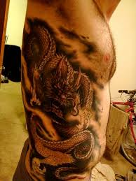 Lion crown tattoo looks majestic. 35 Best Dragon Lion Tattoo Meaning