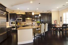 This dramatic wood kitchen floor is made from tanzanian wenge hardwoods. 34 Kitchens With Dark Wood Floors Pictures Dark Wood Floors Dark Kitchen Floors Hardwood Floors Dark