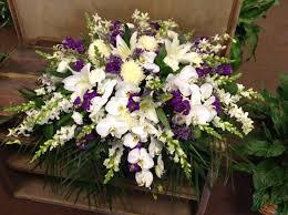 A traditional love heart funeral tribute based with white chrysanthemums topped with a beautiful flower spray. The Best Flowers To Send In Germany For 9 Different Occasion Live Enhanced