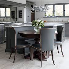 Banquette Seating At The Island Offers An Informal Dining Area For Breakfast Or A Low Key F Kitchen Seating Open Plan Kitchen Living Room Kitchen Dining Living