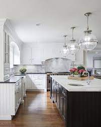 20 Gorgeous Black White Kitchens On Maison De Cinq Black Kitchen Countertops Luxury Kitchen Design White Kitchen Design