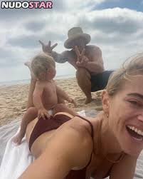 Browse her sexy lingerie and bikini shots