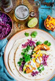 Gently tear the fish into large chunks and lay on top of the taco fillings. Spicy Fish Tacos Fish Tacos Spicy Recipes Healthy Food Swaps